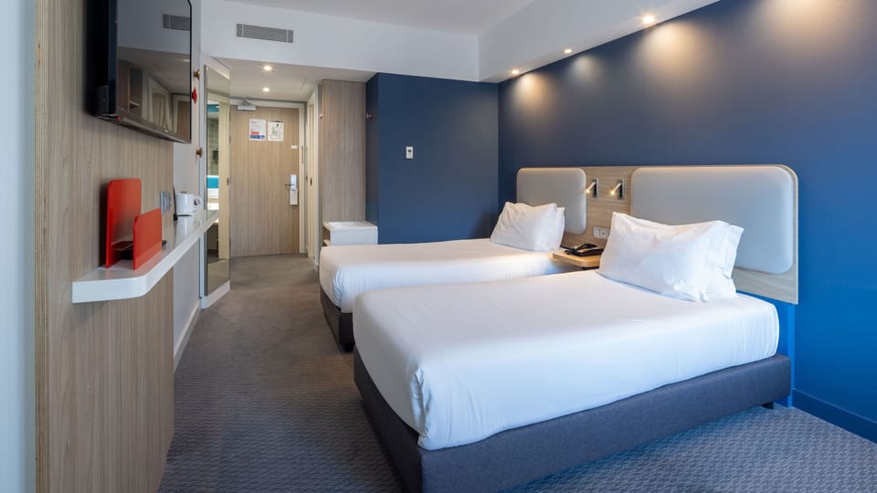 Standard Room, Multiple Beds (Free Breakfast) | Desk, soundproofing, iron/ironing board, free WiFi