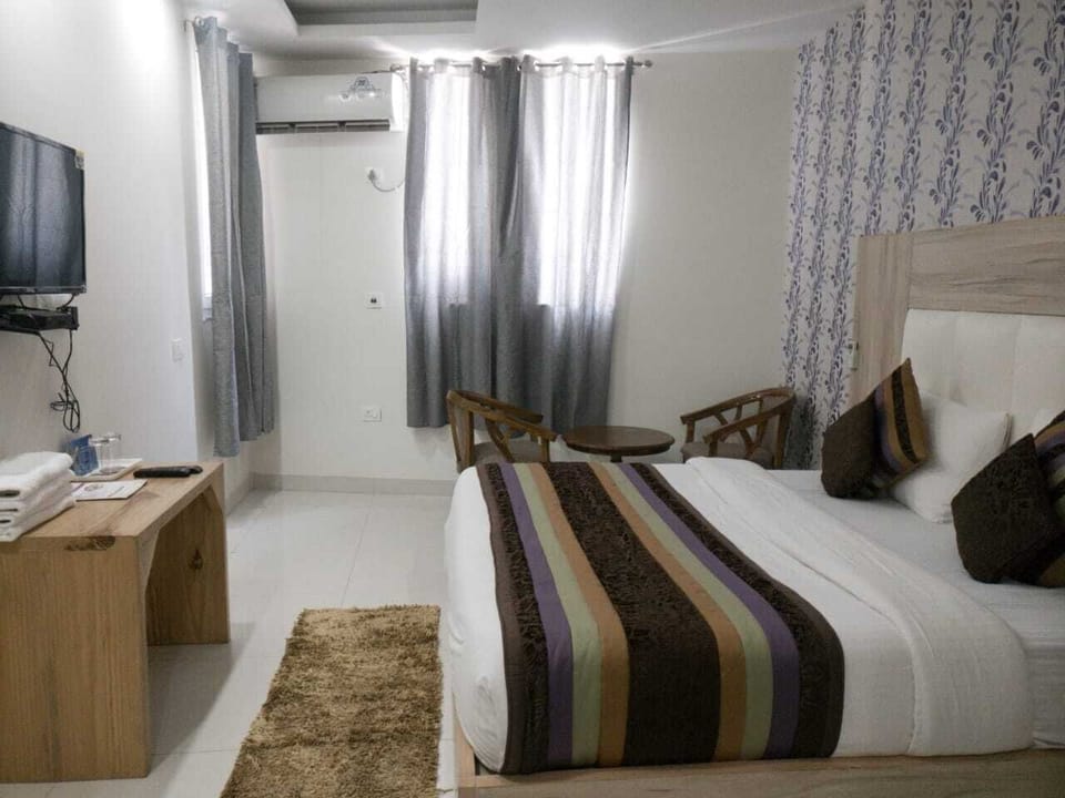 Pillowtop beds, blackout drapes, soundproofing, iron/ironing board