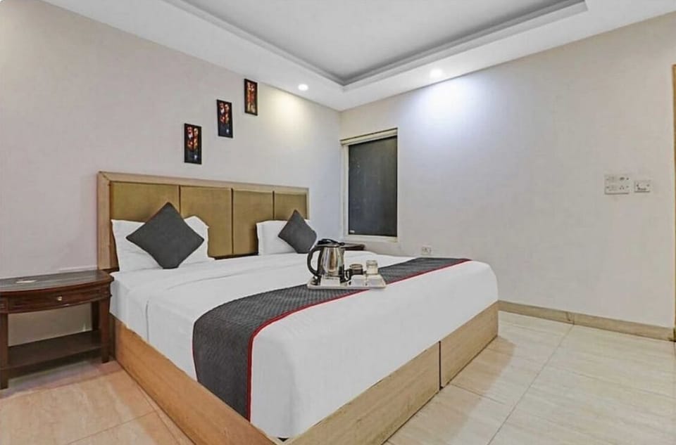 Deluxe Room With Airport Transfer | Pillowtop beds, blackout drapes, soundproofing, iron/ironing board
