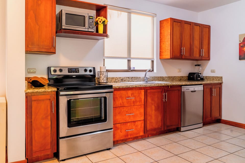KITCHEN W/ELECTRIC STOVE, DISHWASHER AND MICROWAVE