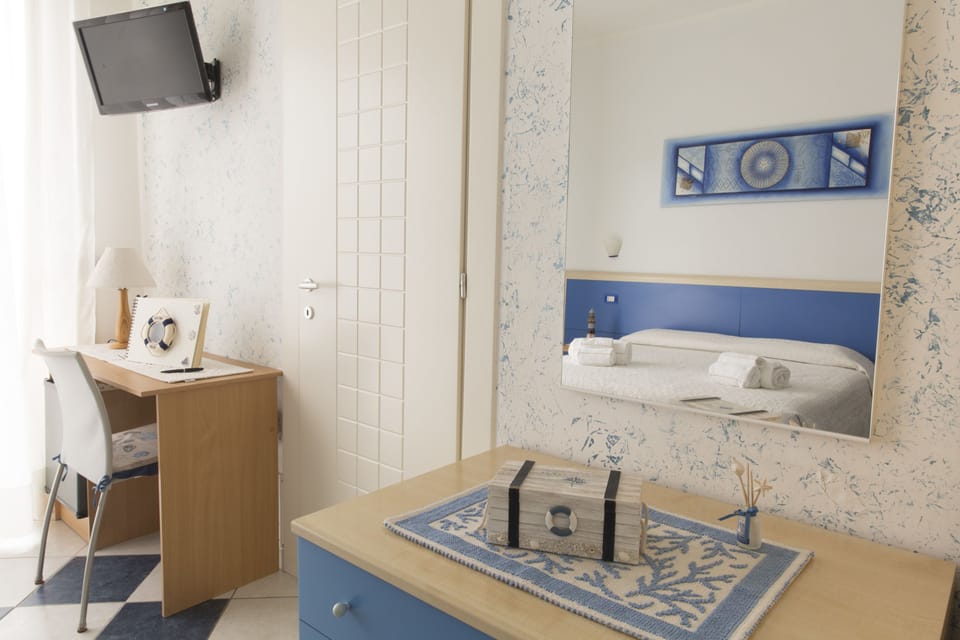 Double or Twin Room, Sea View | Desk, iron/ironing board, free WiFi, bed sheets