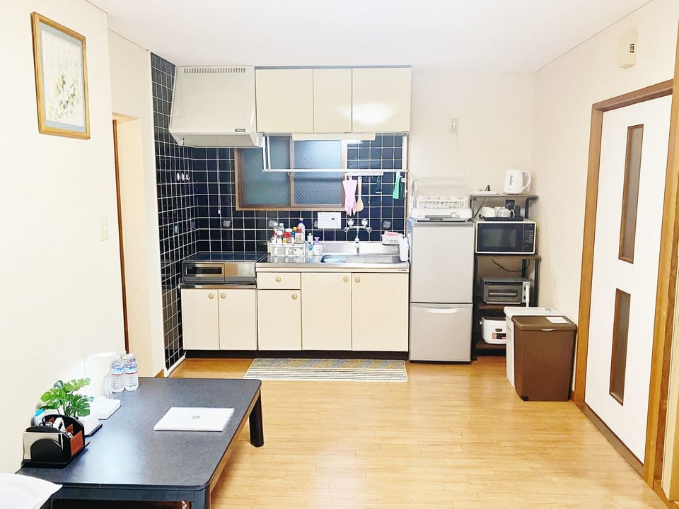 Deluxe Family Room (2LDK) | Private kitchen | Coffee/tea maker, shared fridge, shared microwave, electric kettle