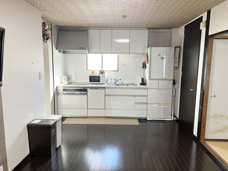 Family Room, 2 Bedrooms, Balcony (2LDK) | Private kitchen | Coffee/tea maker, shared fridge, shared microwave, electric kettle