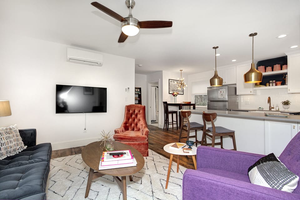 A bright, stylish space equipped with a 50" UHD Smart-TV with Netflix.