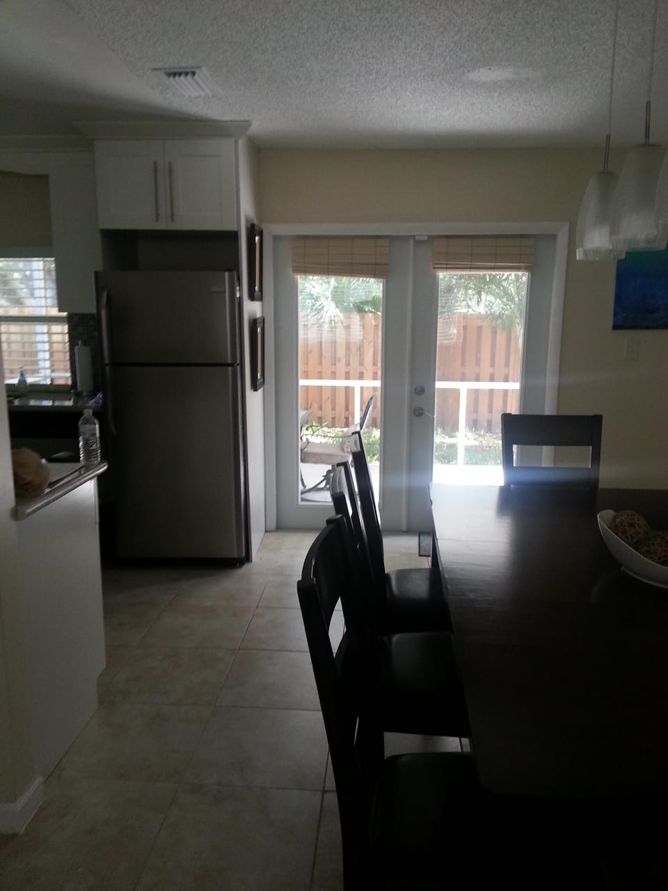 Dining area with French doors to lanai
