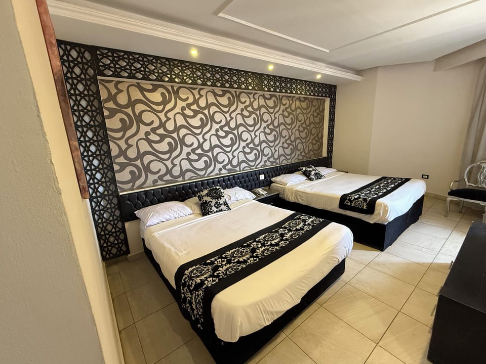 Blackout drapes, WiFi (free), bed sheets