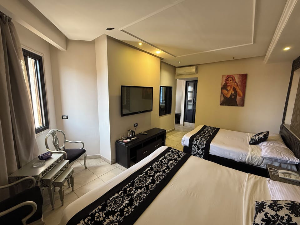 Blackout drapes, WiFi (free), bed sheets