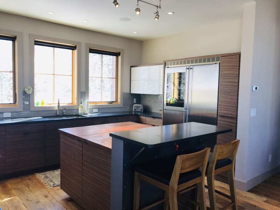 Kitchen has high end  gourmet appliances and is generously stocked.