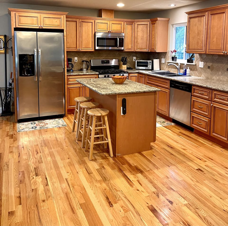 "Grand Room" kitchen. 50% of main floor is kitchen + front room for gathering.