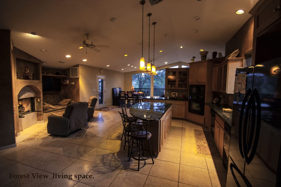 Large Kitchen &TV room Large enough to skateboard in However we had to stop that