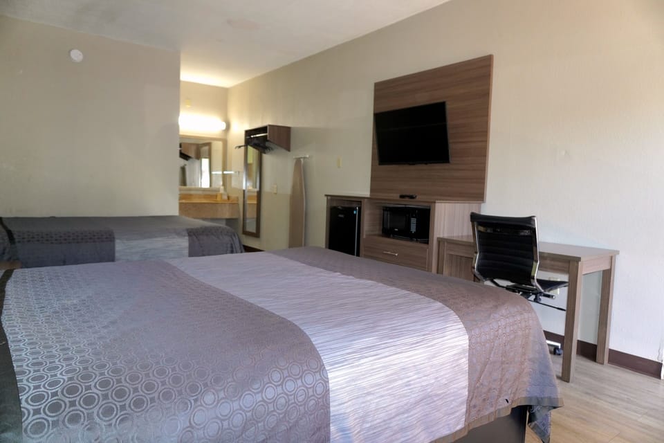 Desk, iron/ironing board, WiFi (free), bed sheets
