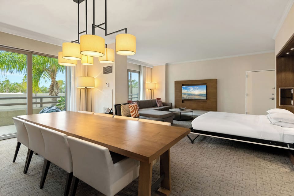 Exclusive Studio Suite, Balcony (1 King Murphy Bed) | Premium bedding, in-room safe, desk, laptop workspace