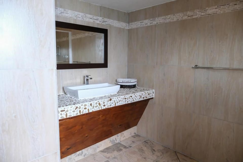 Family Room, 2 Bedrooms, Sea View | Bathroom sink
