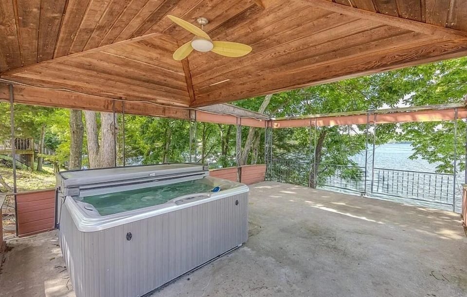 Hot tub area with lake view