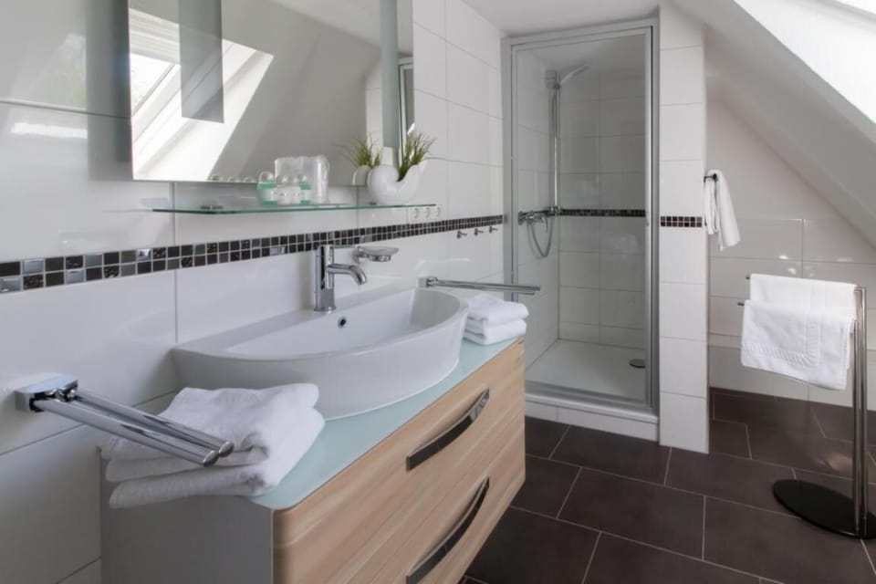Shower, free toiletries, hair dryer, bathrobes