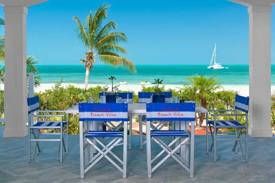 Coconut Beach Villa - Dining on our large covered patio!