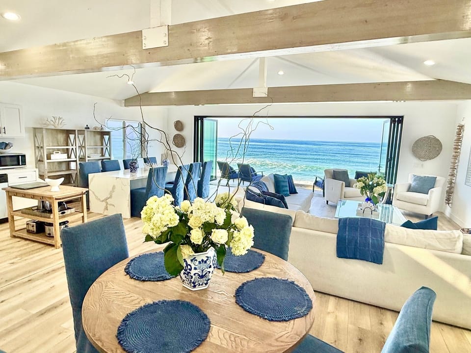 Big beach house right on the sand where you can walk to restaurants