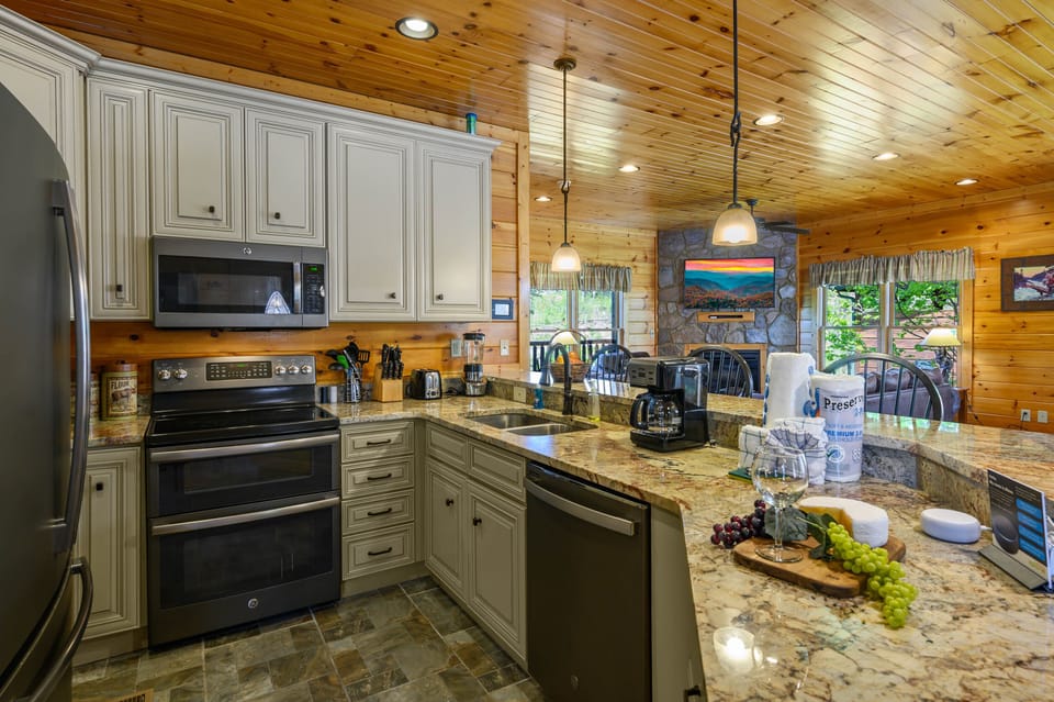 Fully Equipped Kitchen with dishwasher, double sink, and double