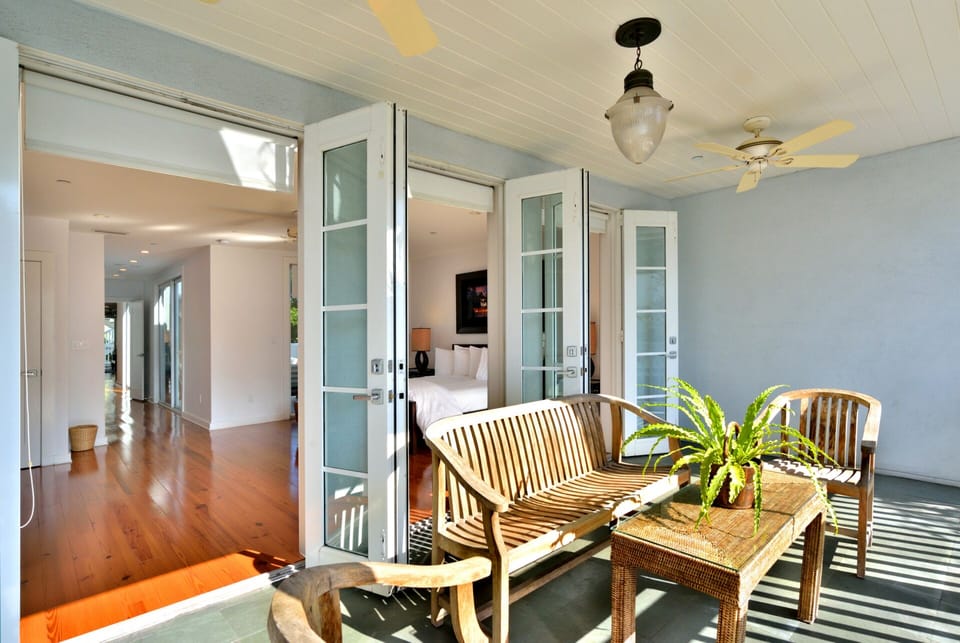 French doors open up on to Duval Street off the master bedroom.