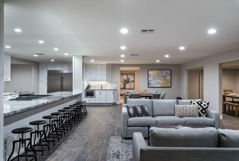 [Main Living Spaces] Open to the kitchen, living, and dining area with ample seating