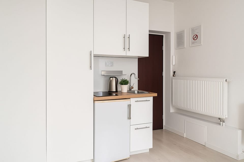 Apartment, City View | Living area | 32-inch flat-screen TV with cable channels, TV