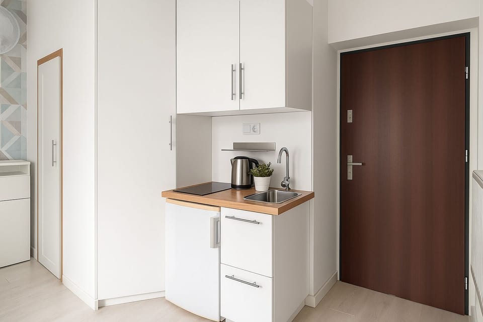 Apartment, City View | Living area | 32-inch flat-screen TV with cable channels, TV