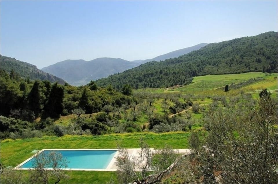 View of pool and farming estate
