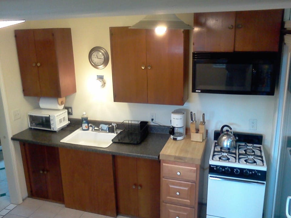Full Kitchen With Gas Stove.