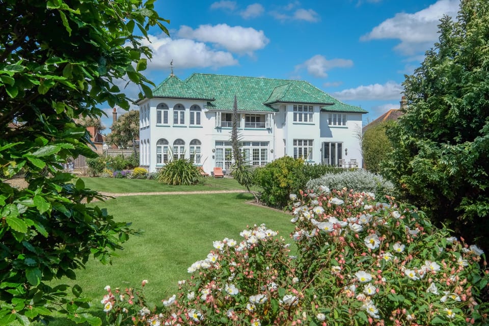House from the garden path in early summer