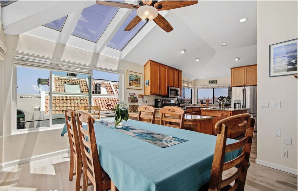 Large dining table with counter bar and bistro set can seat 12.