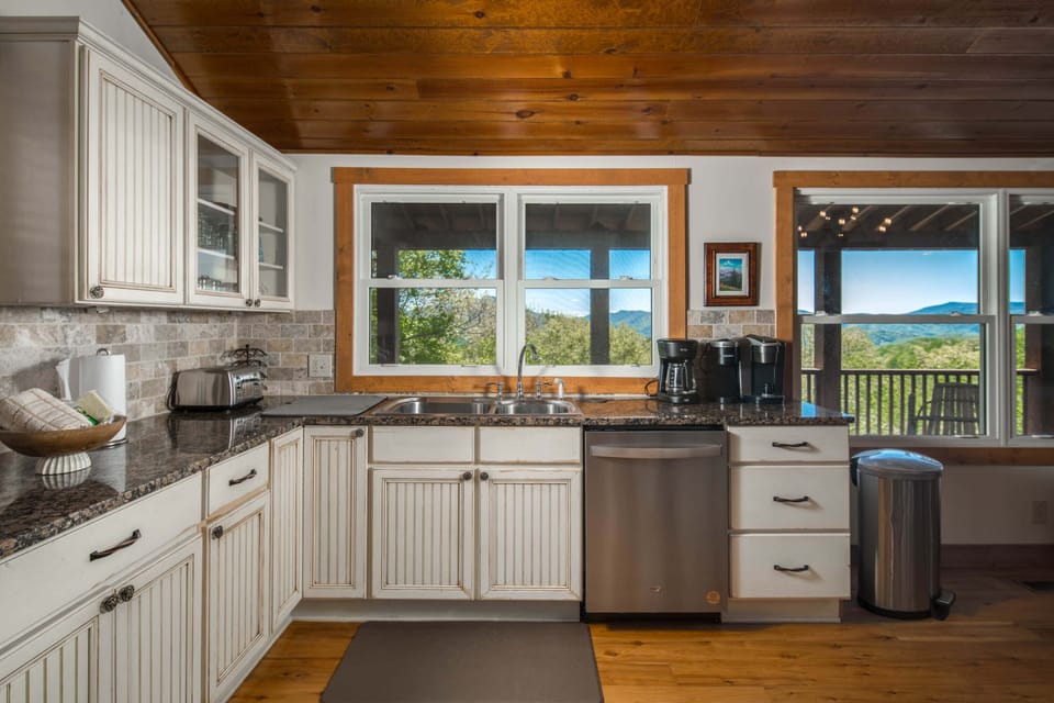 Bright kitchen with beautiful mountain views and everything needed for home-cooked meals