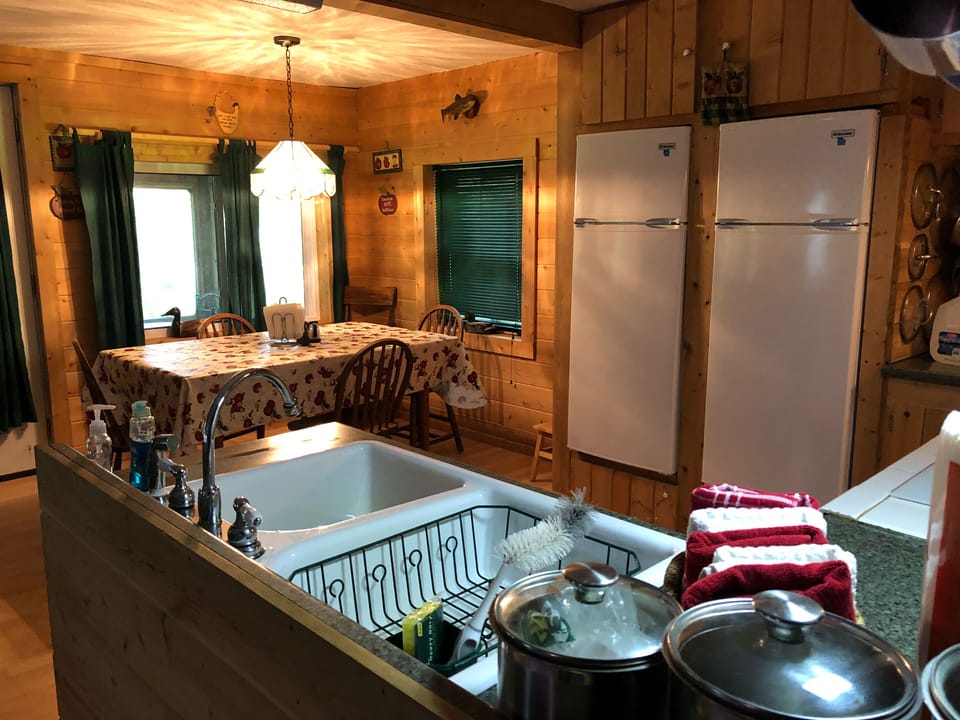 Doing dishes the old fashion way makes wonderful memories of close conversations