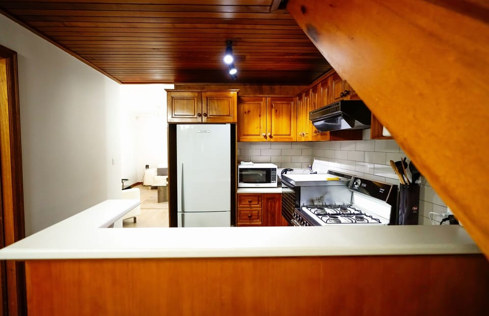 Townhome, 2 Bedrooms | Private kitchen | Full-size fridge, microwave, oven, stovetop