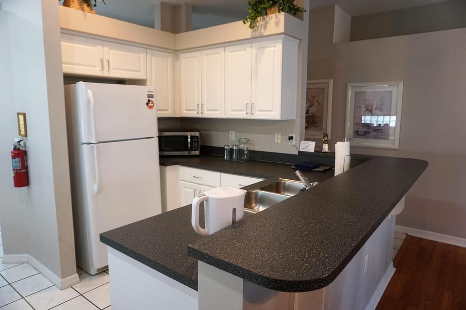 Double sink, refrigerator, microwave
