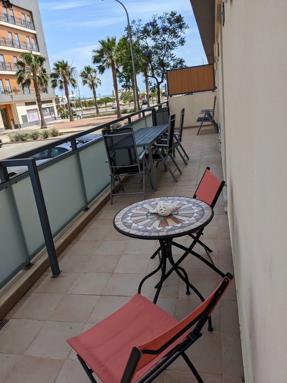 13 meter long terrace with seating and tables and views towards Ria Formosa