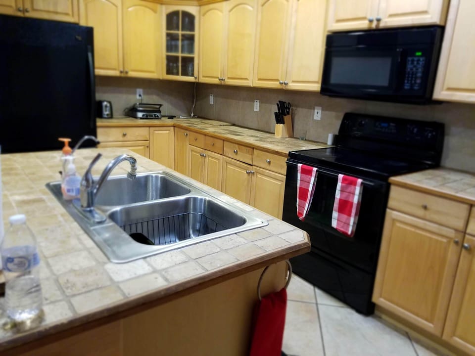 Exclusive House, Multiple Beds, Non Smoking, Garden View | Private kitchen | Full-size fridge, microwave, oven, stovetop