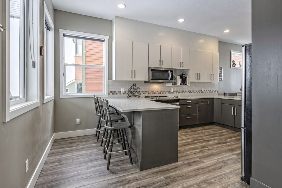 Upper - Breakfast Bar on both Sides of the Kitchen 