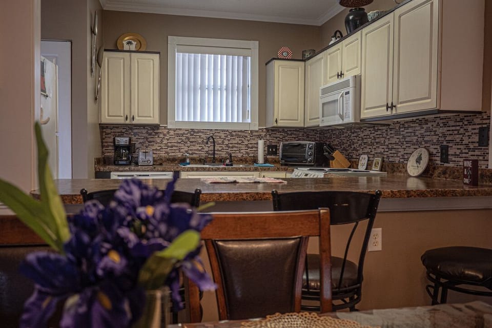 Dining area looking into kitchen