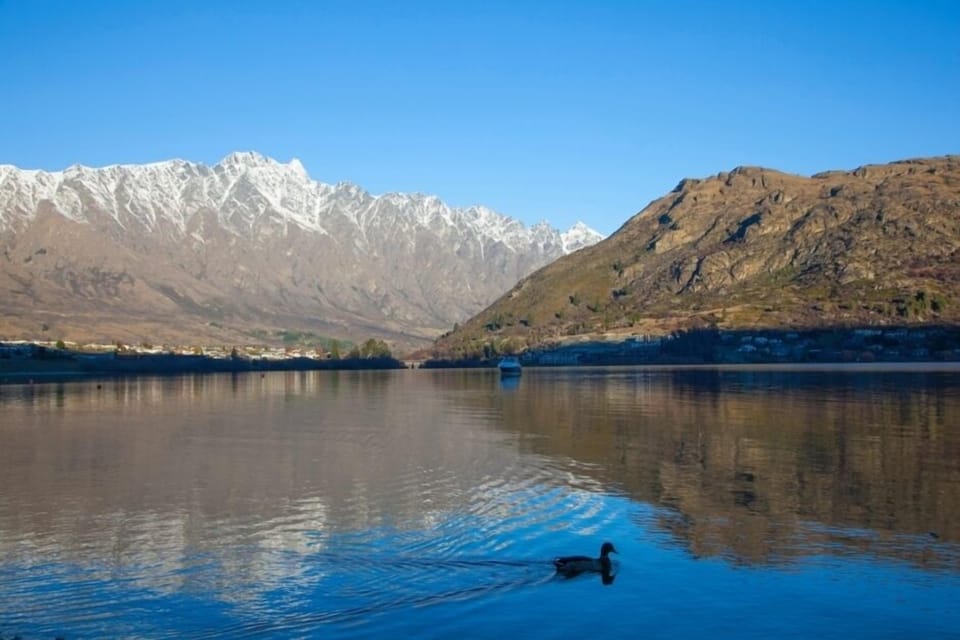 Lake Wakatipu at sunset from jetty by the complex