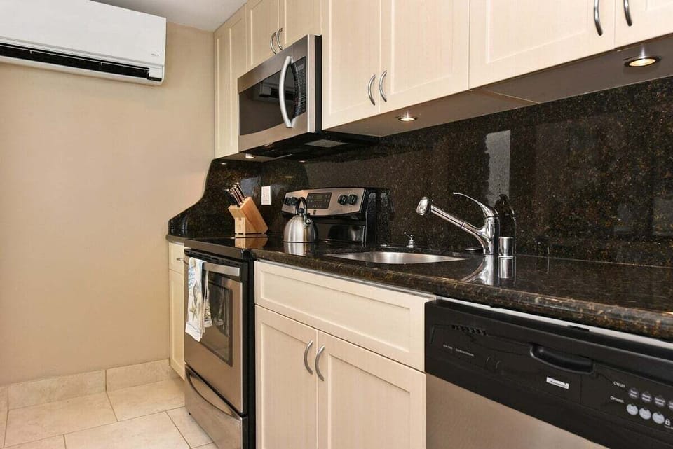 Modern convenience meets island charm with a deep sink and premium kitchen finishes.