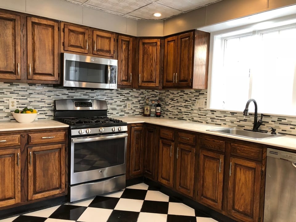 Lots of cabinet space, stainless steel appliances, pantry area,...