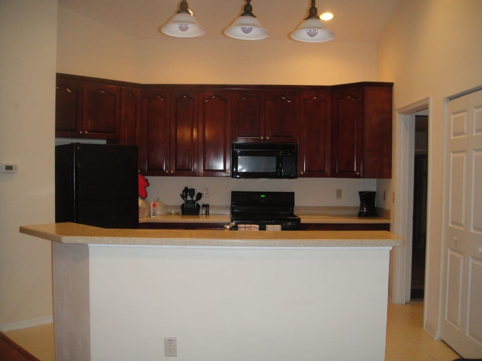 Wide open kitchen with large island complete with all amenities