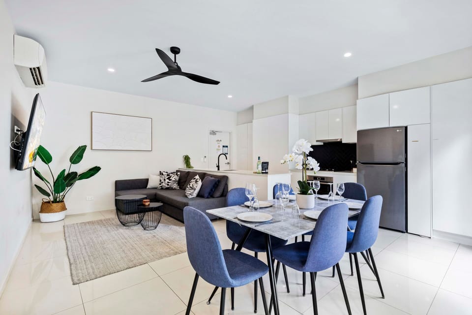 Dining sits between kitchen and lounge for meals, TV time and relaxed living.