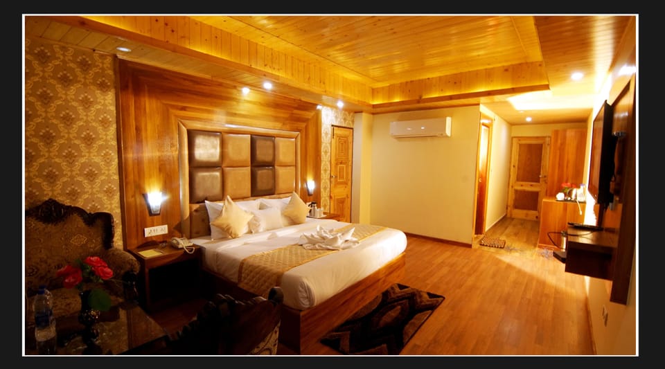 Super Deluxe Room | Living room | 40-inch LED TV with satellite channels, TV