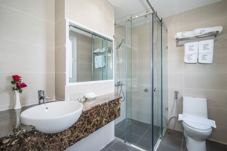 Shower, free toiletries, hair dryer, slippers