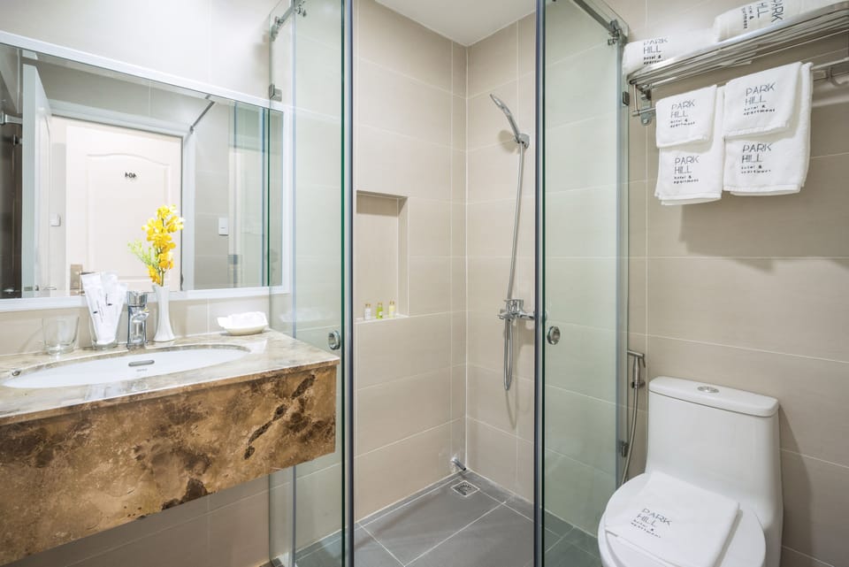 Shower, free toiletries, hair dryer, slippers