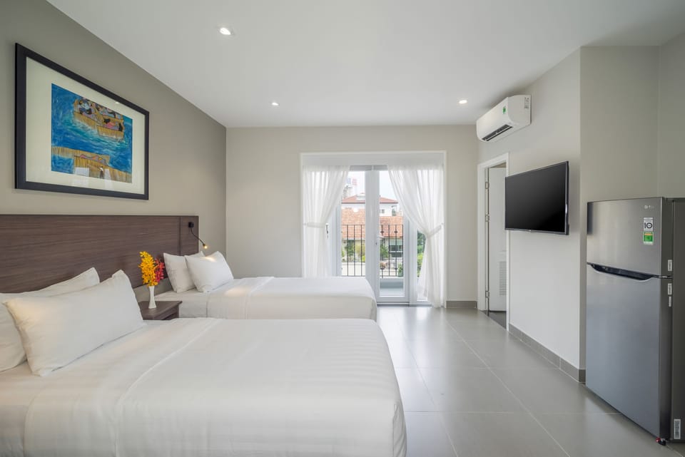 Family Suite Balcony | In-room safe, desk, soundproofing, iron/ironing board