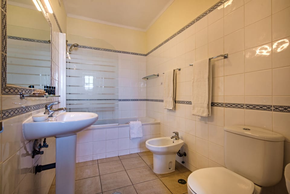1st floor Bathroom with bath-shower and toilet