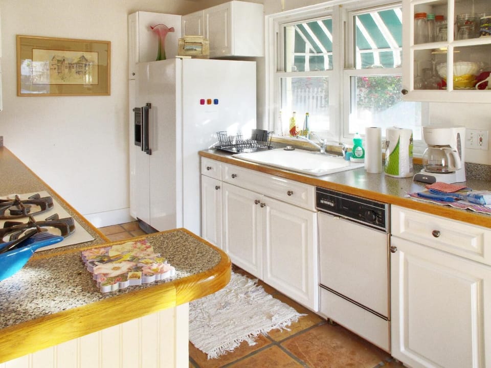 Kitchen with gas stove and dishwasher.