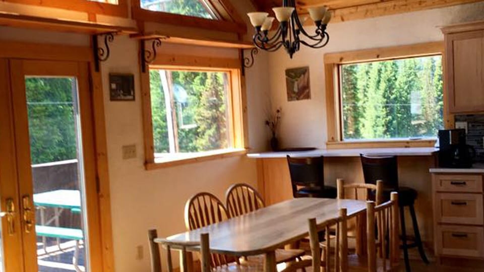 Gather around the large dining table to eat while enjoying all the views.